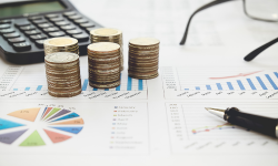 stack of coins of financial charts